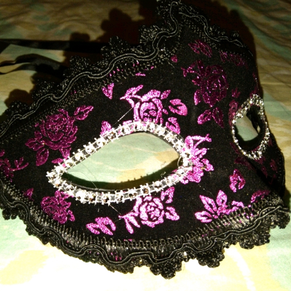 black and pink floral masquerade mask